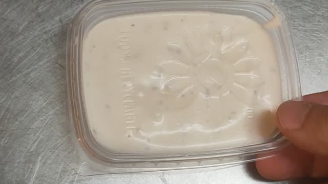 Closing A Garlic Sauce Cup
