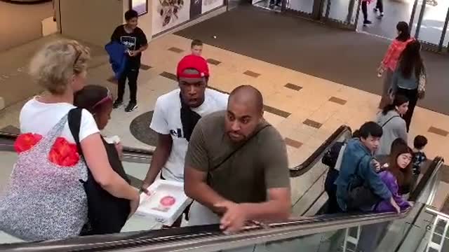 Funny video on the escalator