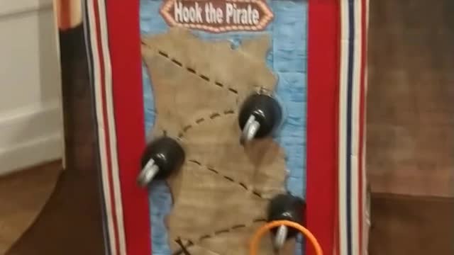 Hook the pirate ring toss game at the spring event venue in Angleton Texas at wedding reception