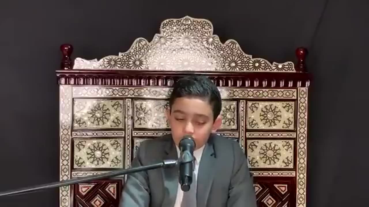 Emotional Quran recitation by small kid.