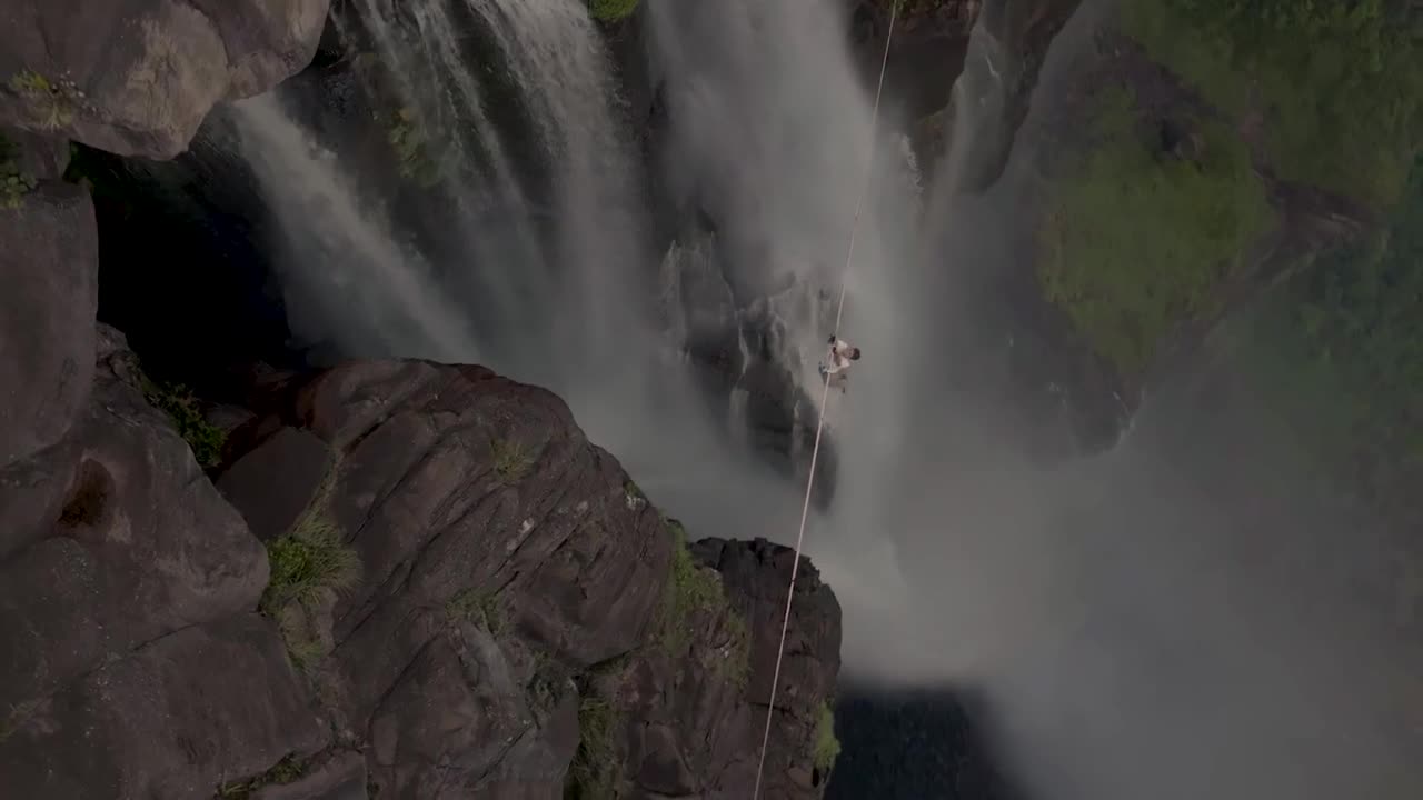 Jay Alvarrez rope walks highest waterfall