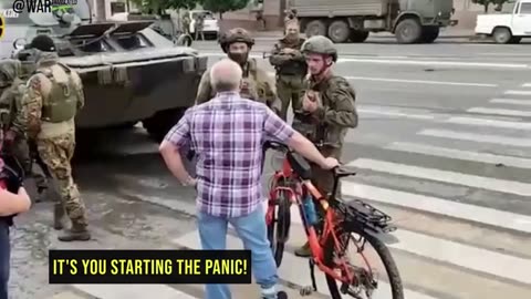 Local man arguing with Wagners near their BTR-82А in Rostov.......