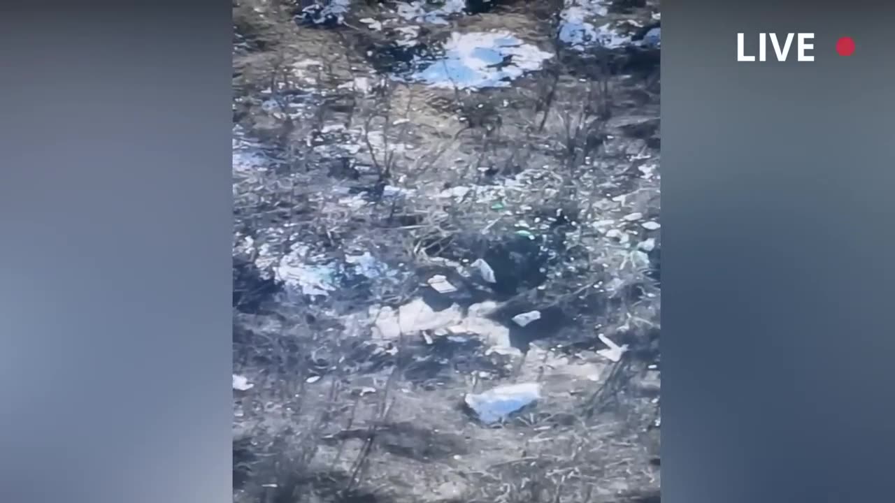 Kamikaze drone lands on Russian troops as they try to shot it down.