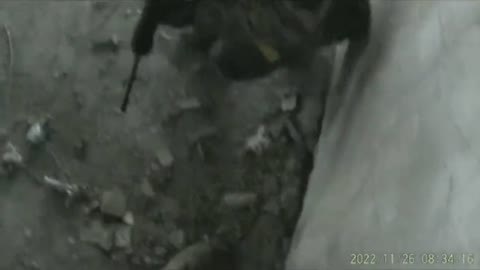 Military personnel of the Armed Forces of Ukraine during a clash on the outskirts of Bakhmut