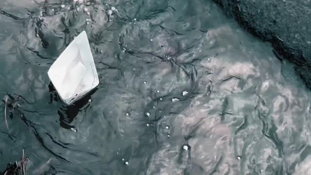 Papermaking boat running in the river what a splendor