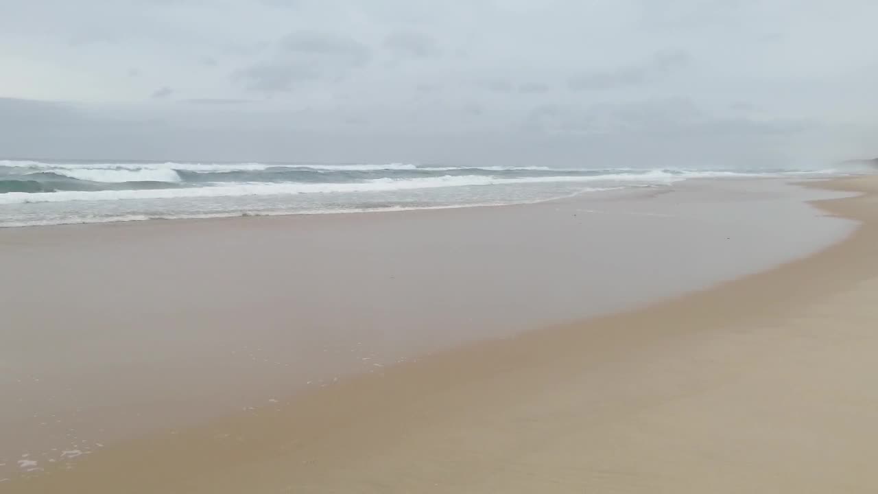 Waves Crashing on Deserted Beach