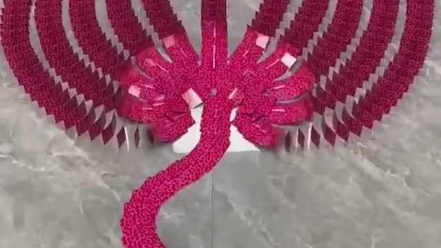 A new work is here, built from more than 10,000 dominoes