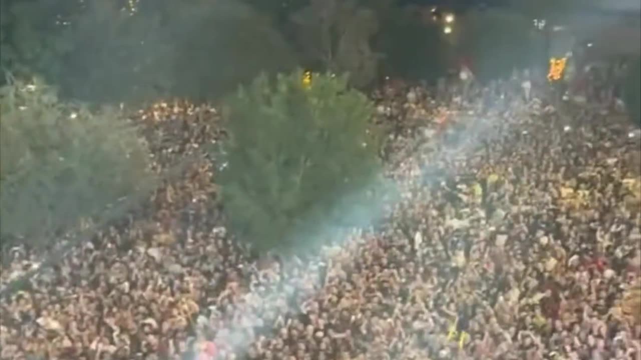 People in Vegas singing US National Anthem