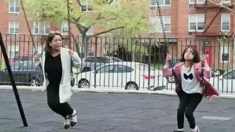 Two girls enjoy entertain in the park