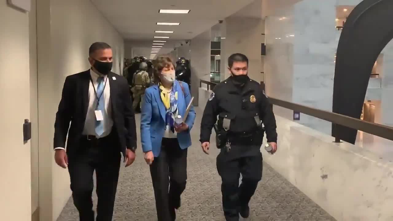 Senators begin to get escorted back to the Capitol