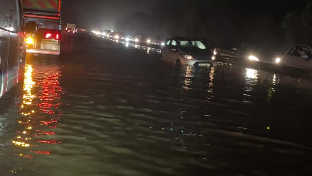 Cars Stuck in Flood Waters on Road A27