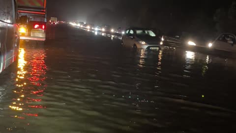 Cars Stuck in Flood Waters on Road A27