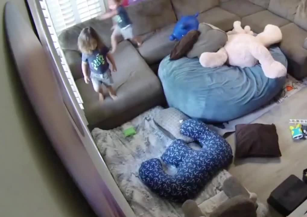 Toddler Pushes His Brother Off The Couch And Jumps Over Him