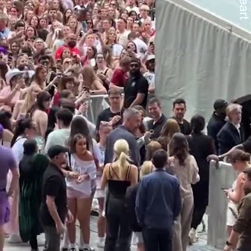 Paul McCartney dances with Taylor Swift fans as he arrives at gig