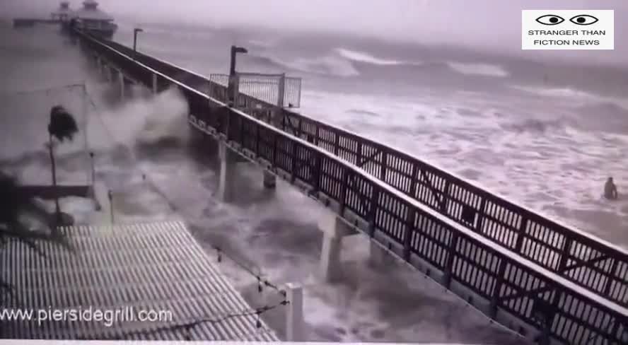 Florida - People going into the ocean in Fort Myers Beach as Hurricane Ian Hits