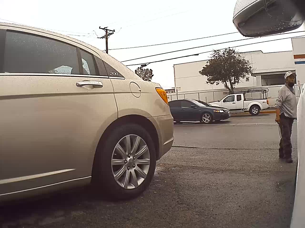 Crazy dude hits Tesla