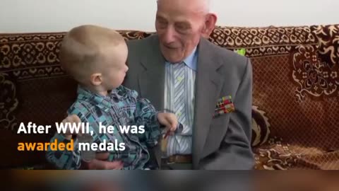 100-year-old WWII veteran in Russia's Republic of Altai celebrates his birthday with family.