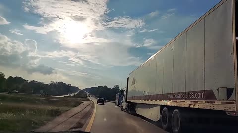 Truck Turning Into Car Lane as It Attempt to Overtake It