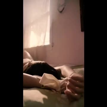 Selena Gomez in bikini on her bed lookin sexy