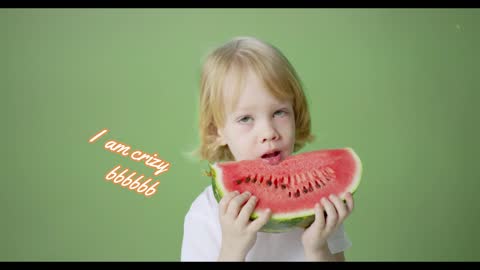 Pretty little girl who eats watermelon greedily and loudly ????