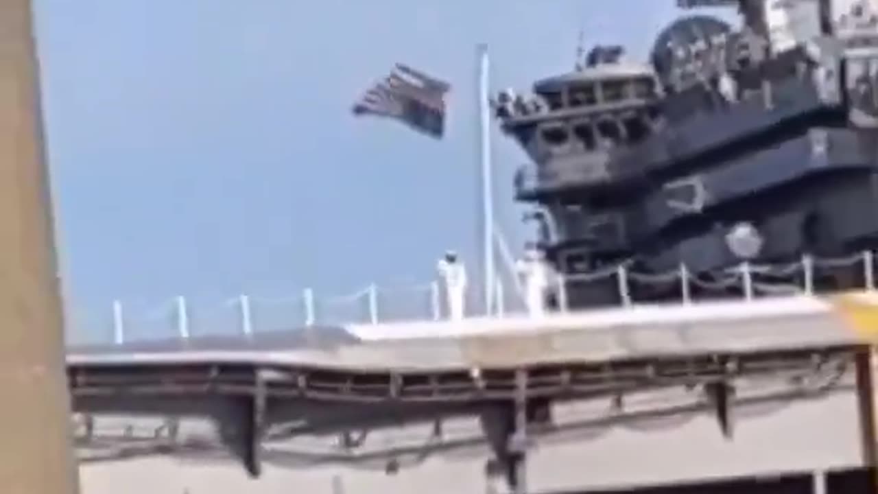 American flag flying upside down on a US Navy Ship 10/22023