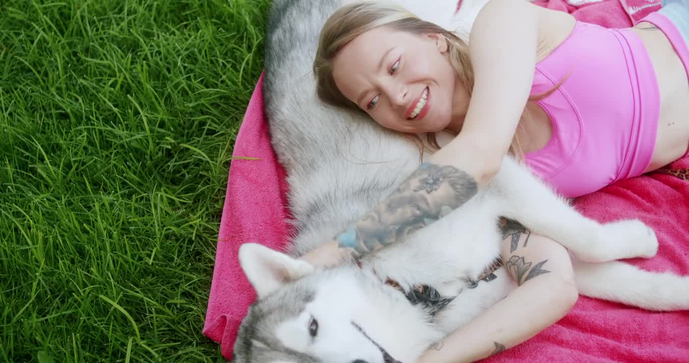 Women Petting her Lovely Dog.