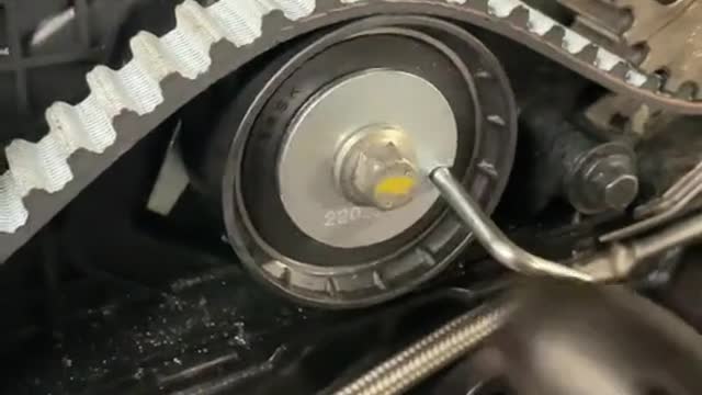 Automobile engine belt adjustment and car repair