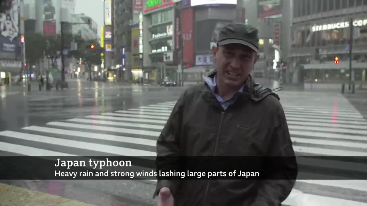 Japan hit by biggest typhoon in decades - BBC News