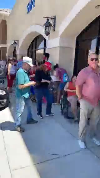 Hundreds of people, both days, enduring the elements while waiting in line to hear DJT speak.