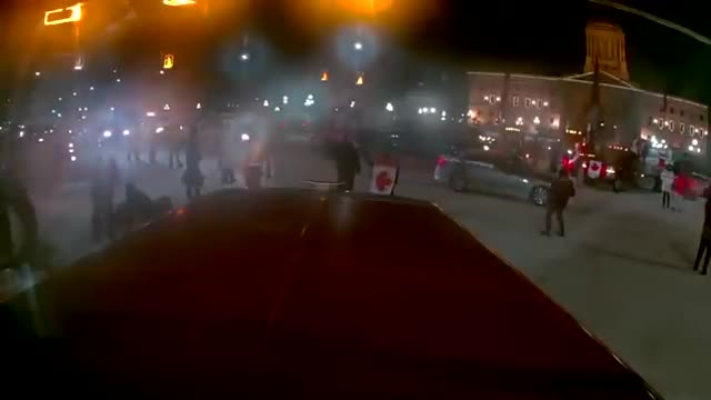 Vehicle runs over peaceful Protester in Winnipeg
