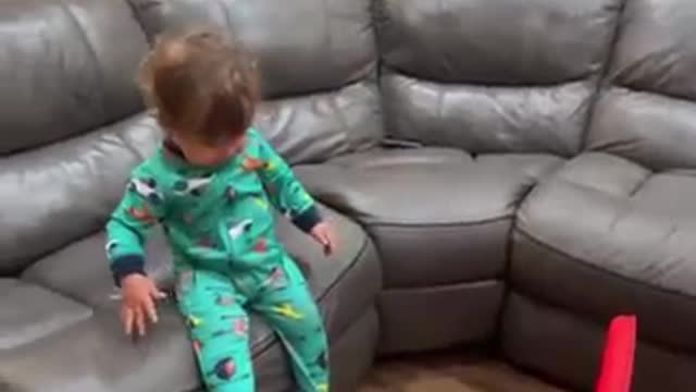 1 year old makes trick shot!