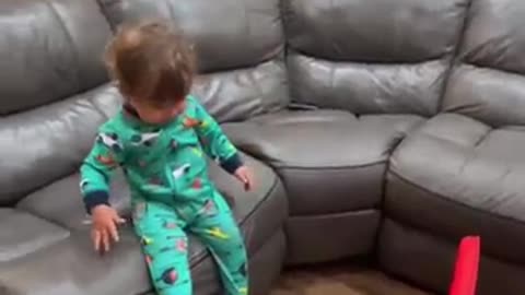 1 year old makes trick shot!