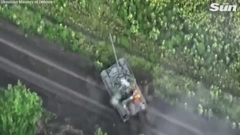 Ukrainian forces blow up Russian tank sending soldier feeling for his life