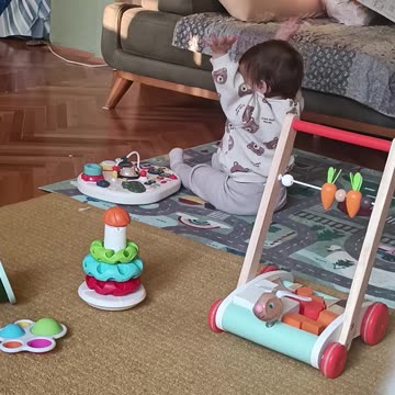 Disappointed baby puts her hands down when she realises there is no music to dance on