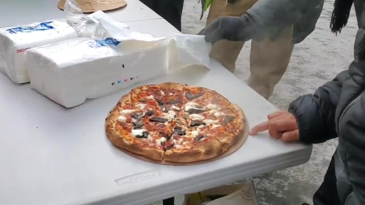 Free pizza being served to the Freedom Convoy in Ottawa