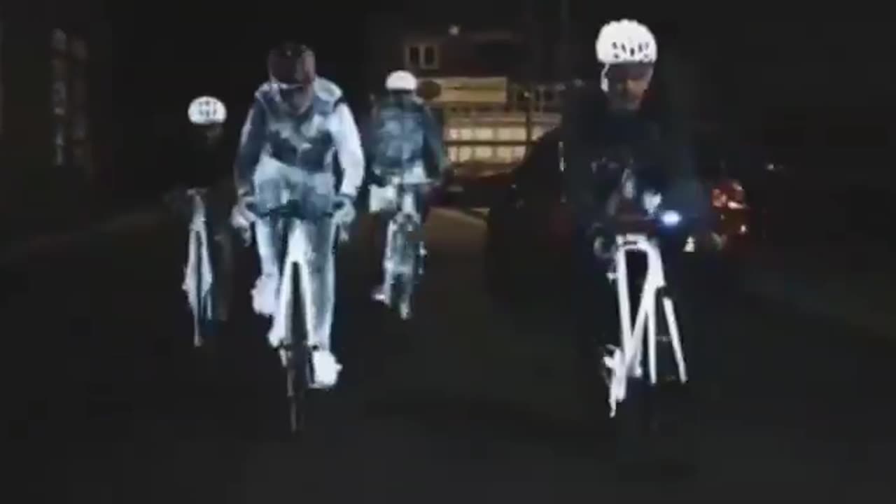 COLORLESS COMPOUND SPRAYED ON BIKES SURFACE REFLECTS THE LIGHT OF HEADLIGHTS IN DARK LIKE ROAD SIGNS