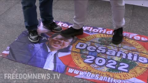 Trump Supporters STOMP on DeSantis Flag Outside Trump Tower in NYC ahead of "Major Announcement"