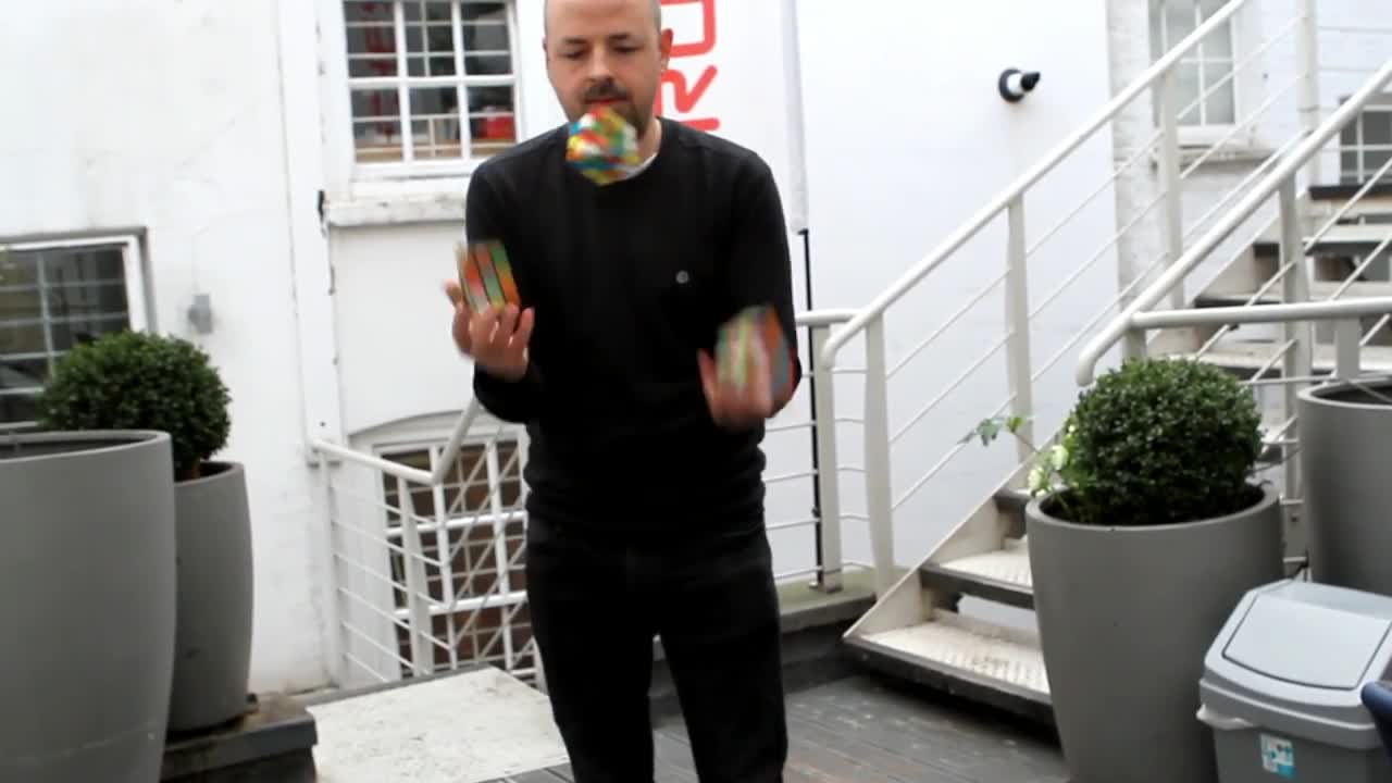 Solving 3 Rubik's Cubes in under 20 seconds whilst Juggling Mills Mess