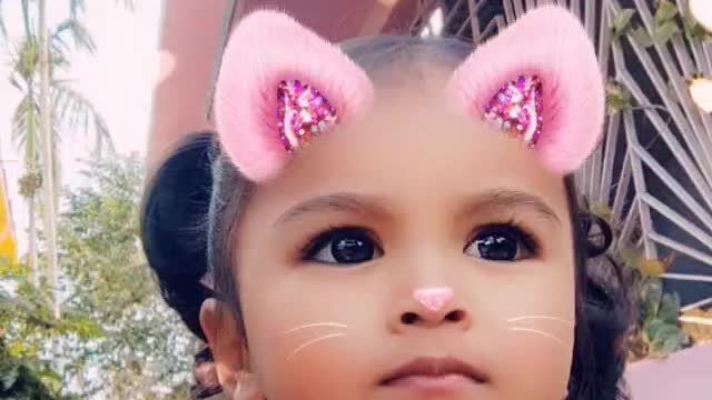 Little girl playing like a 🐱