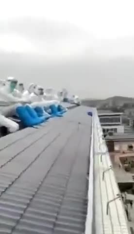 CHINA: Local government workers threatening to commit suicide.