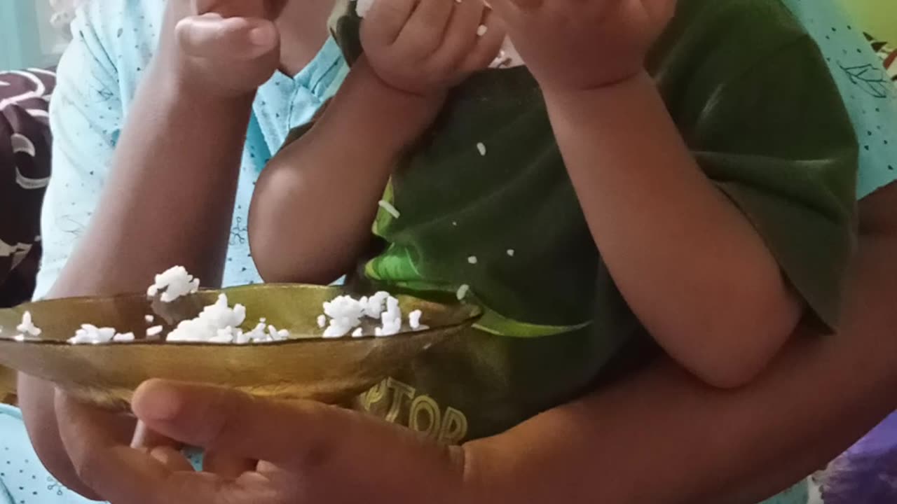 Eating rice for the first time