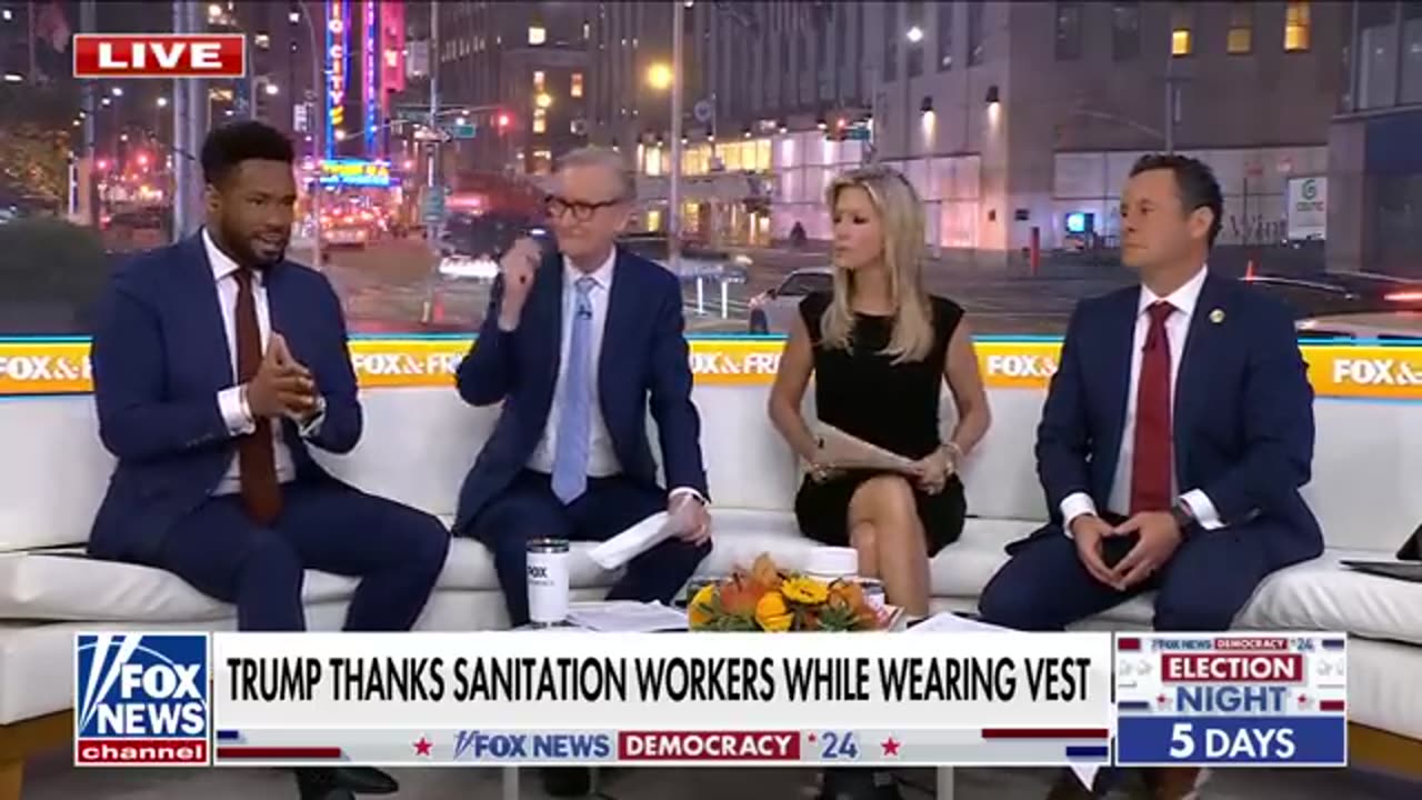 Trump STUNS in sanitation outfit while giving presser from garbage truck