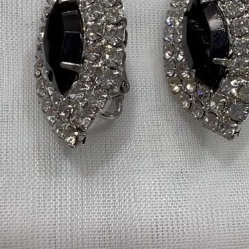 Rhodium Plated 30mm Marquise Clip On Earrings. Made with Swarovski Crystal