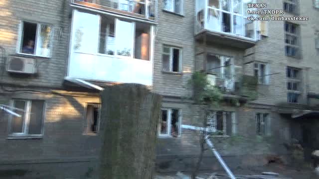 This is the SECOND civilian apartment block bombed today by ukrop nazis with money