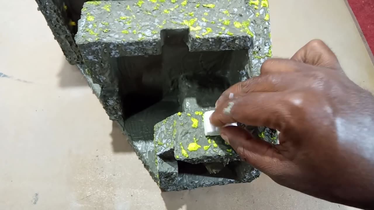 Homemade Styrofoam and cement mini water fountain waterfall