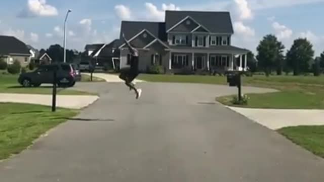 WOW! Man jumping cross over a road