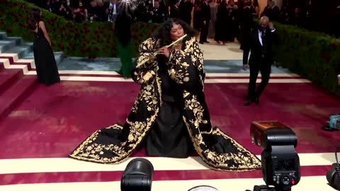 Lizzo plays flute on Met Gala red carpet