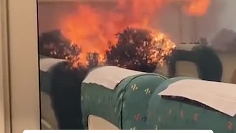 Train flanked by wildfire during unscheduled stop