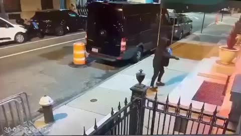masked vandal approaching the Consulate General of the Russian Federation