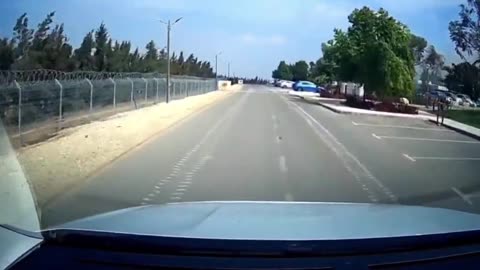 Raw Footage: Israeli father in the Kfar Gaza community drives to try to rescue his